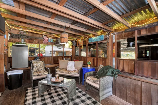 a living room with furniture and a table