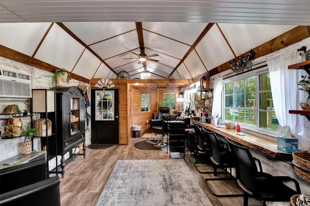 a bathroom with a toilet a sink and a mirror