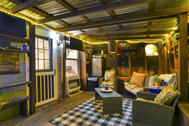 a view of a backyard with a patio