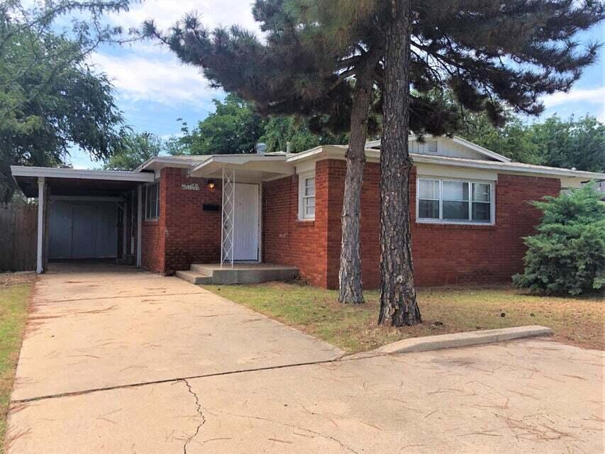 4401 31st Street Lubbock, TX 79410 - Photo 2 of 21 a front view of a house