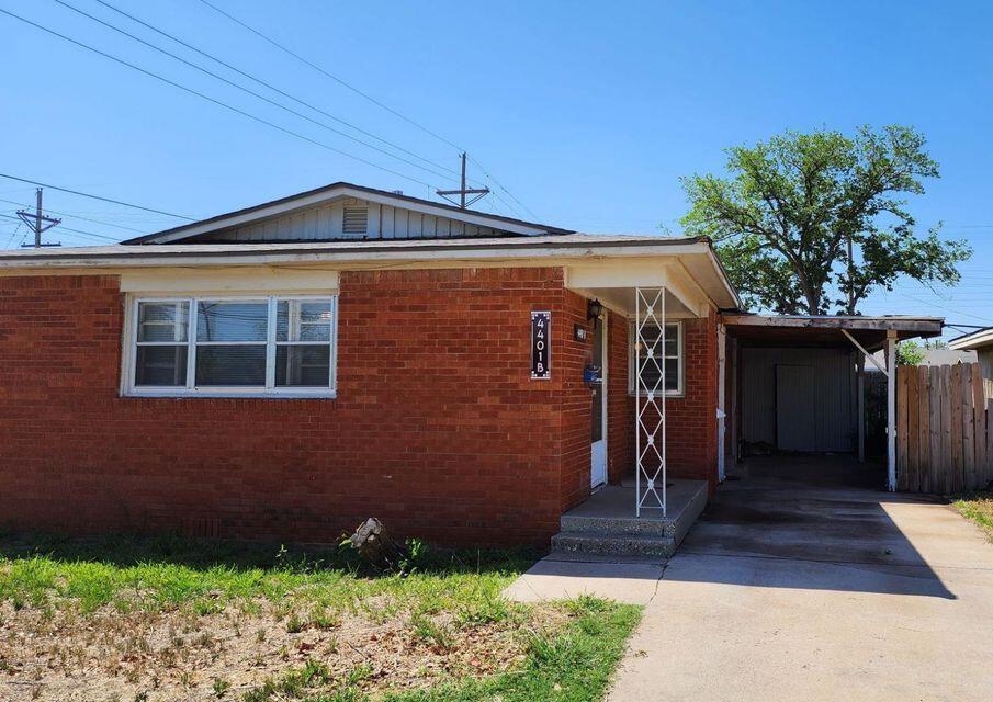 4401 31st Street Lubbock, TX 79410 - Photo 9 of 21 a front view of a house