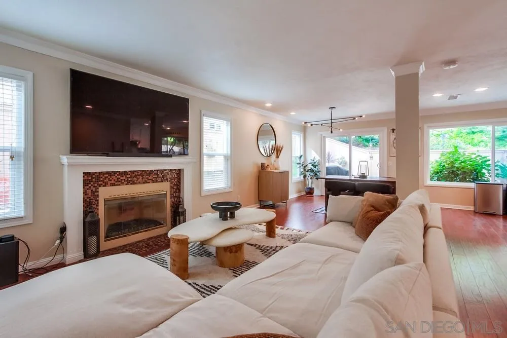 1846 Olympus Loop Drive Vista, CA 92081 - Photo 14 of 34 a living room with furniture and a fireplace