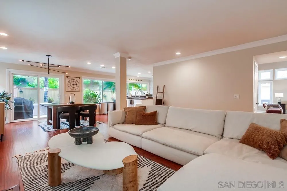 1846 Olympus Loop Drive Vista, CA 92081 - Photo 15 of 34 a living room with furniture and a wooden floor