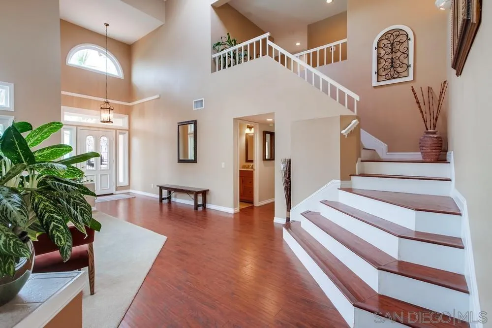 1846 Olympus Loop Drive Vista, CA 92081 - Photo 18 of 34 a view of entryway and hall with wooden floor