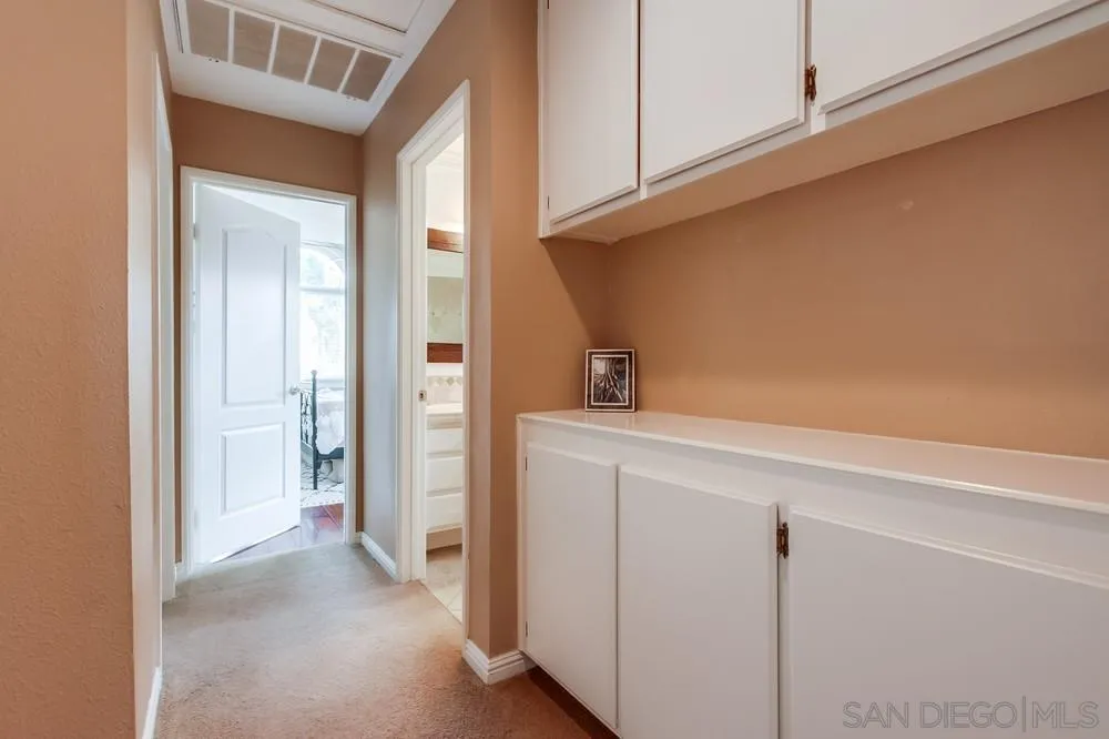 1846 Olympus Loop Drive Vista, CA 92081 - Photo 23 of 34 a view of storage and utility room with closet