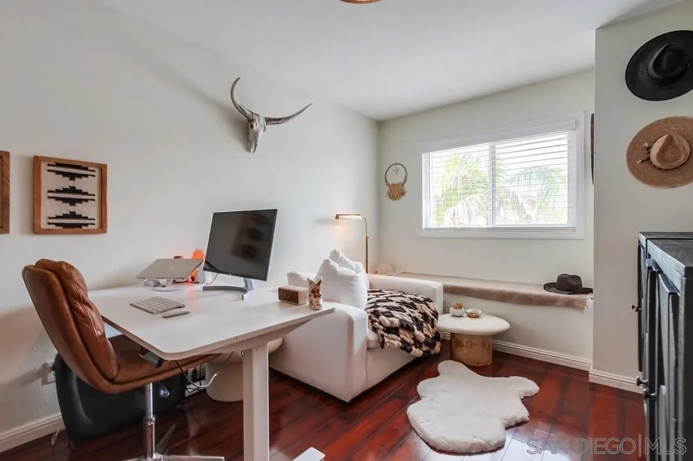 1846 Olympus Loop Drive Vista, CA 92081 - Photo 26 of 34 a view of a workspace with furniture and a window
