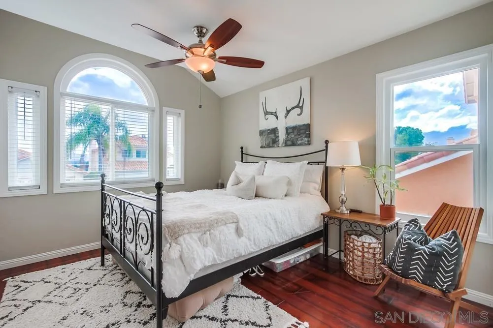 1846 Olympus Loop Drive Vista, CA 92081 - Photo 28 of 34 a bedroom with furniture and windows