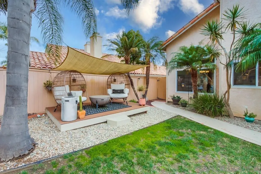 1846 Olympus Loop Drive Vista, CA 92081 - Photo 32 of 34 a view of a house with backyard and a slide
