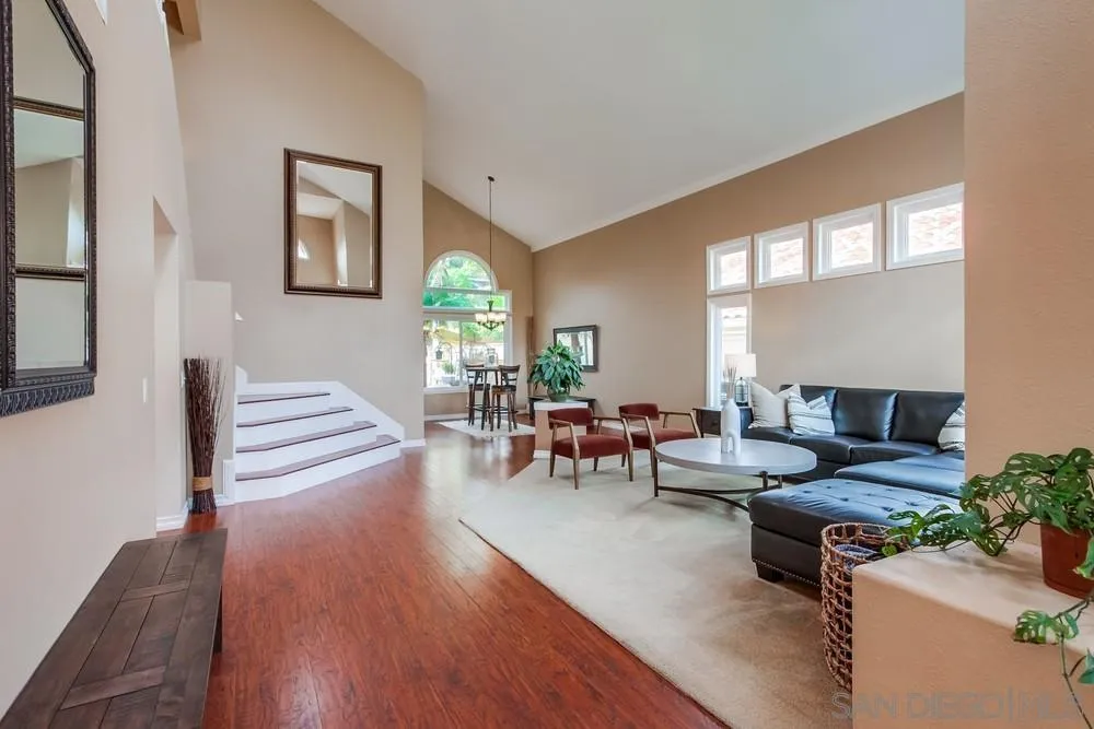 1846 Olympus Loop Drive Vista, CA 92081 - Photo 5 of 34 a living room with furniture and wooden floor