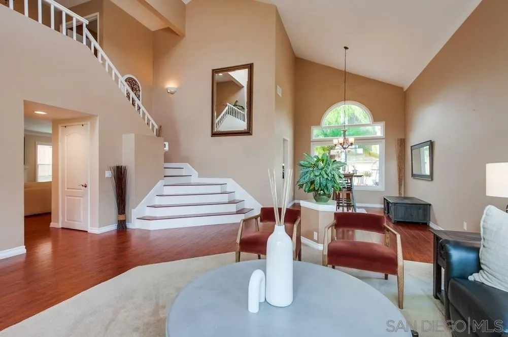 1846 Olympus Loop Drive Vista, CA 92081 - Photo 6 of 34 a living room with furniture and a large window