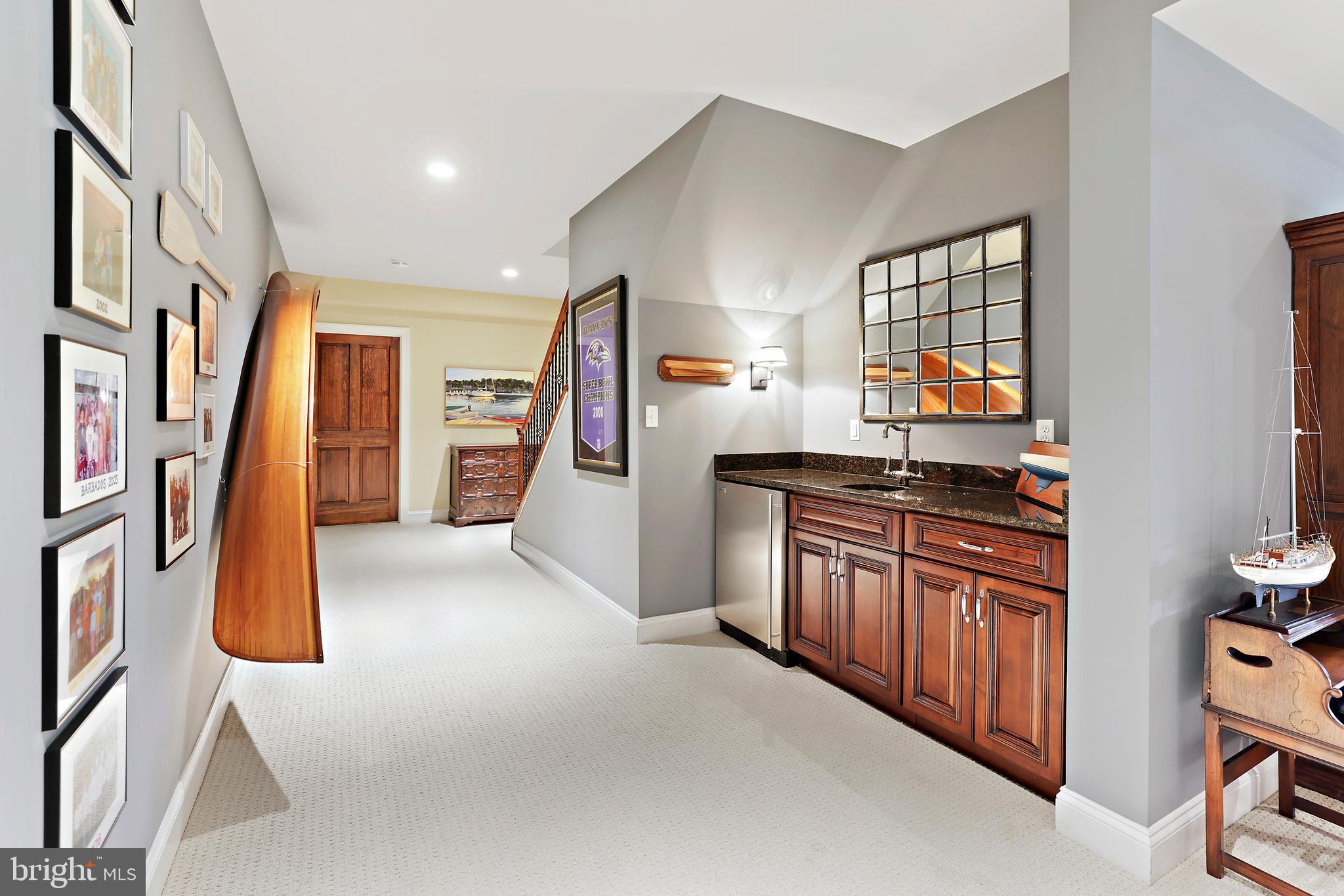 12203 Worthington Road Owings Mills, MD 21117 - Photo 55 of 75 Lower Level Hall and Wet Bar