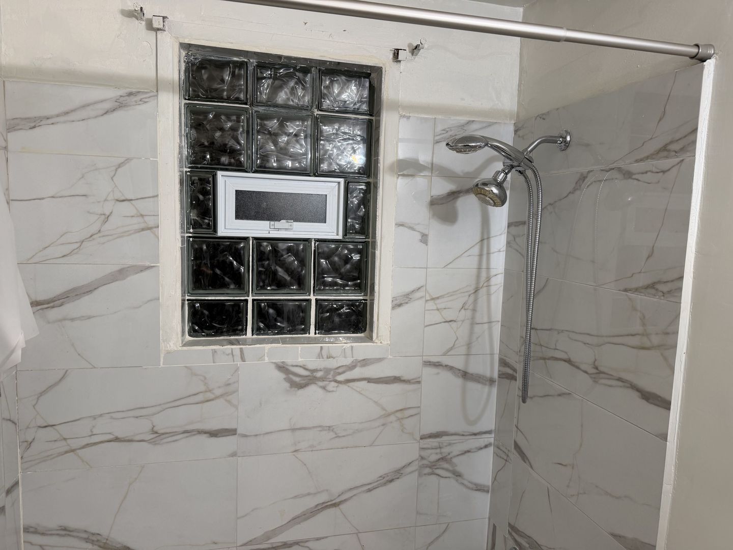 11540 South Racine Avenue Chicago, IL 60643 - Photo 13 of 19 a bathroom with a shower and a sink
