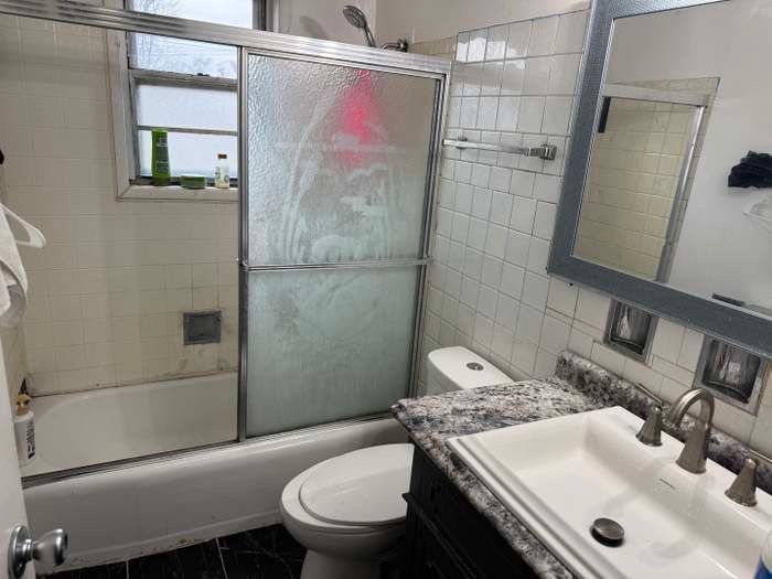 11540 South Racine Avenue Chicago, IL 60643 - Photo 16 of 19 a bathroom with a sink toilet and shower