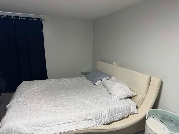 11540 South Racine Avenue Chicago, IL 60643 - Photo 10 of 19 a bedroom with a bed and wooden floor