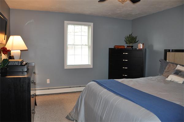 24 1/2 Mason Road Dudley, MA 01571 - Photo 12 of 30 a bedroom with a bed and a closet