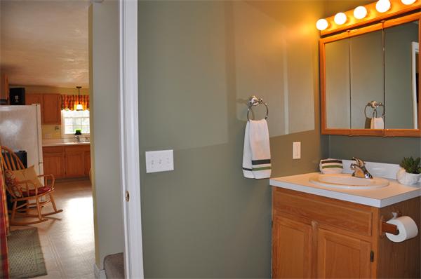 24 1/2 Mason Road Dudley, MA 01571 - Photo 16 of 30 a bathroom with a sink and a mirror