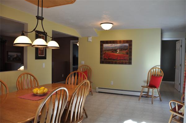 24 1/2 Mason Road Dudley, MA 01571 - Photo 5 of 30 a dining room with furniture and a chandelier