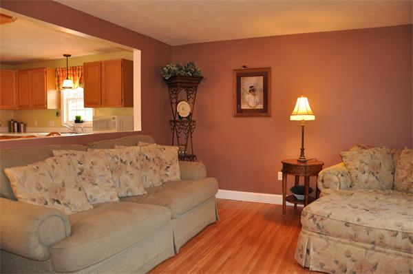 24 1/2 Mason Road Dudley, MA 01571 - Photo 8 of 30 a living room with furniture and a wooden floor