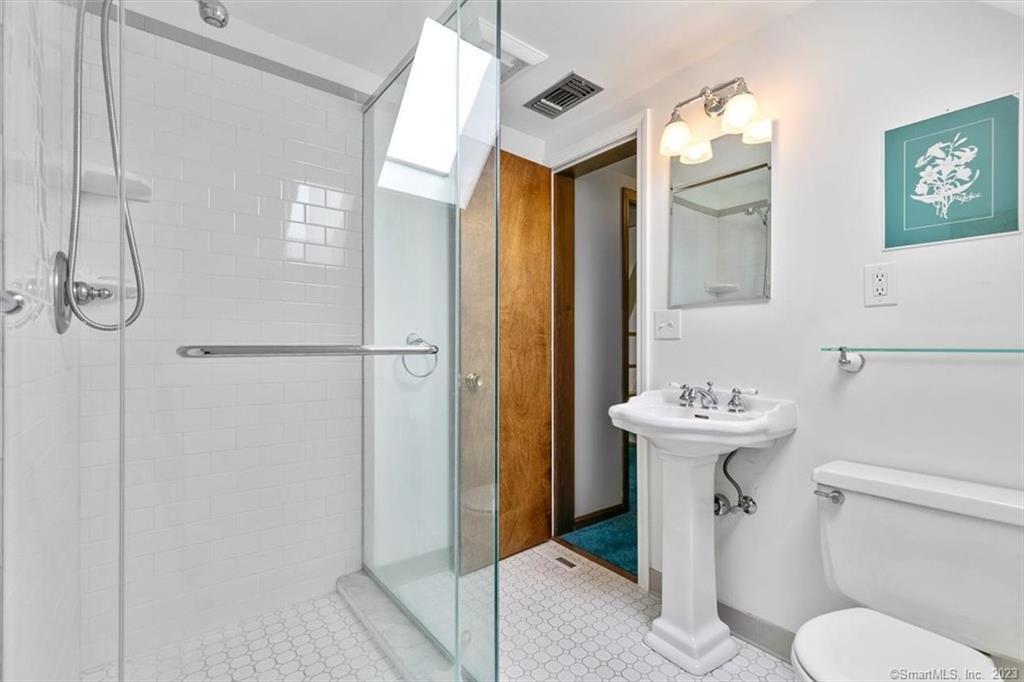 266 Everit Street New Haven, CT 06511 - Photo 15 of 21 a bathroom with a sink a toilet and shower