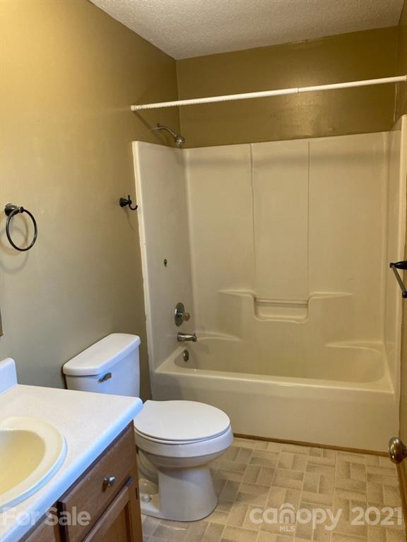 1091 South Beersheba Road Clover, SC 29710 - Photo 17 of 23 a bathroom with a sink a toilet and shower