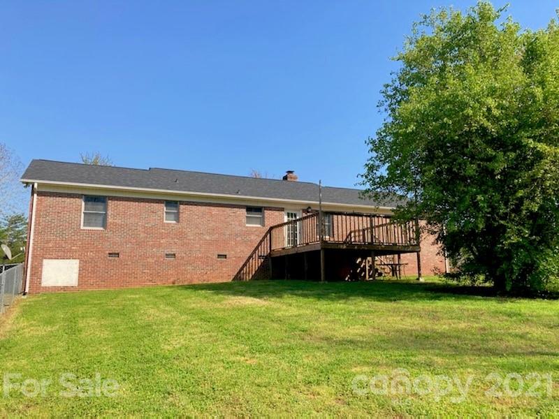 1091 South Beersheba Road Clover, SC 29710 - Photo 22 of 23 a view of a house with a backyard