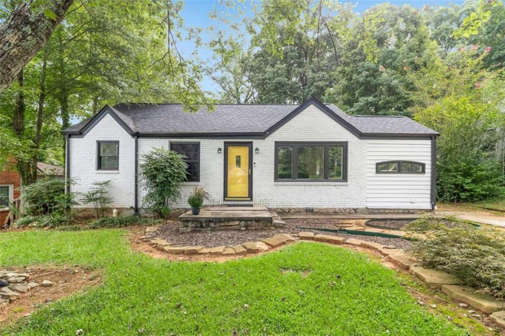 1880 Glendale Drive Decatur, GA 30032 - Photo 1 of 1 a front view of a house with a yard