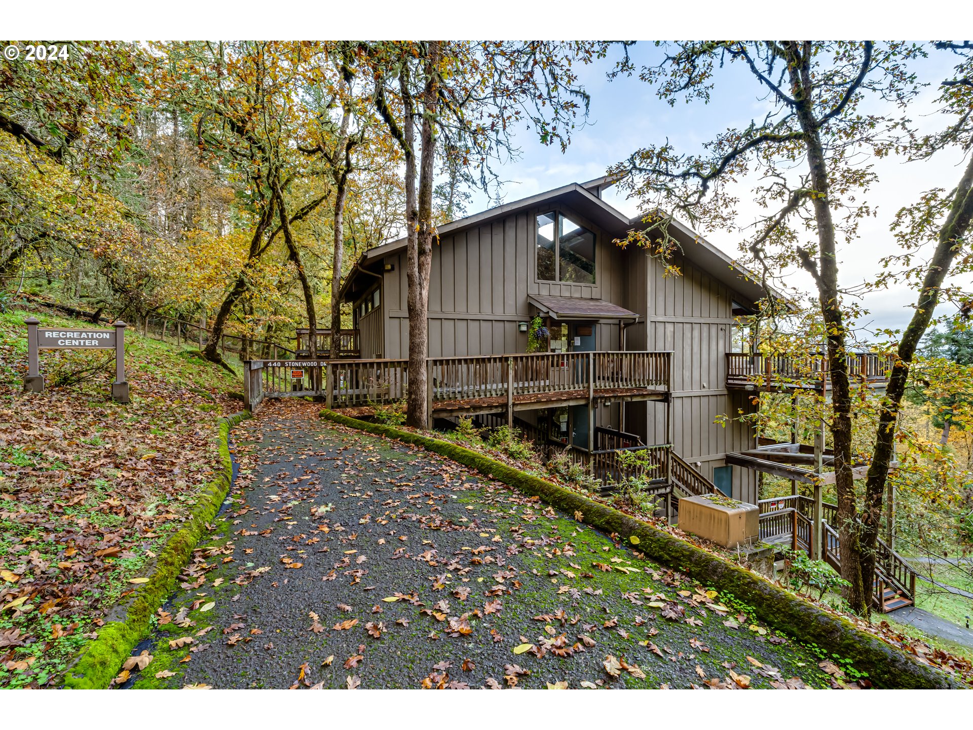 302 Woodcutter Way Eugene, OR 97405 - Photo 23 of 31 a view of a house with a yard