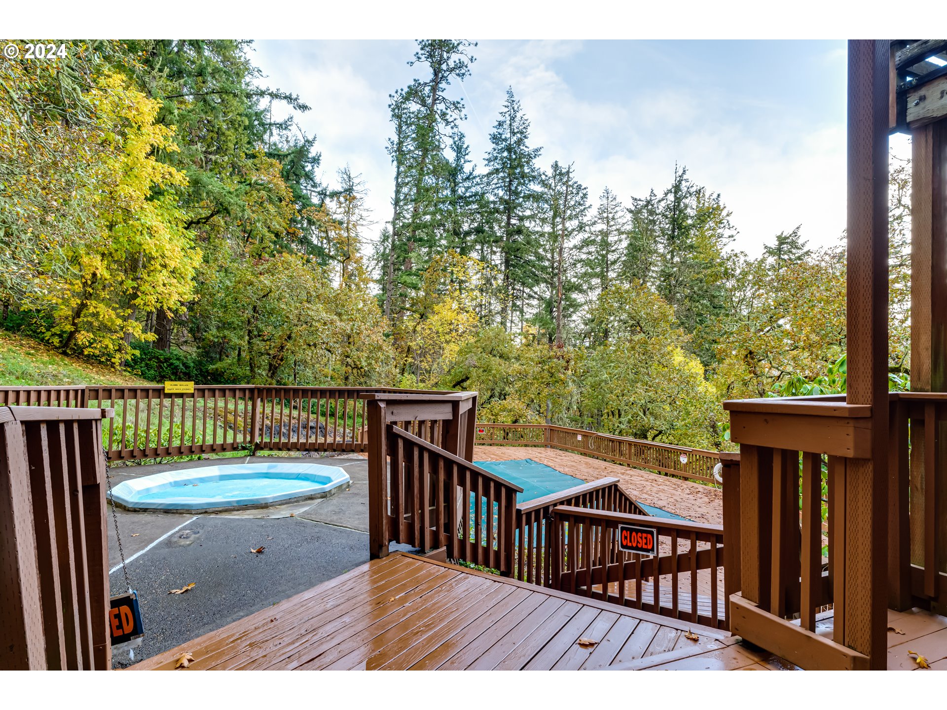 302 Woodcutter Way Eugene, OR 97405 - Photo 24 of 31 a view of a wooden deck with a patio