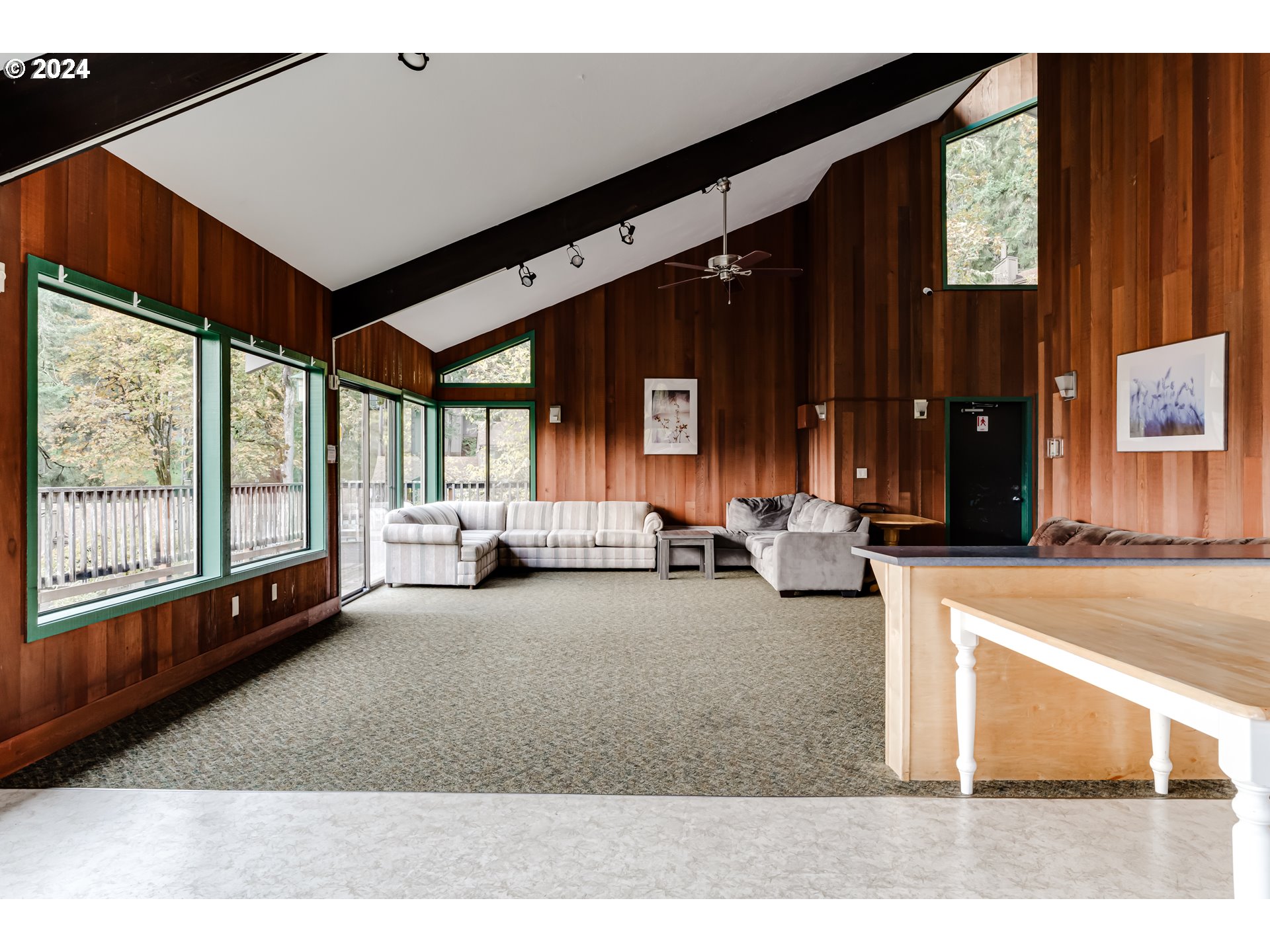 302 Woodcutter Way Eugene, OR 97405 - Photo 27 of 31 a living room with furniture and large windows