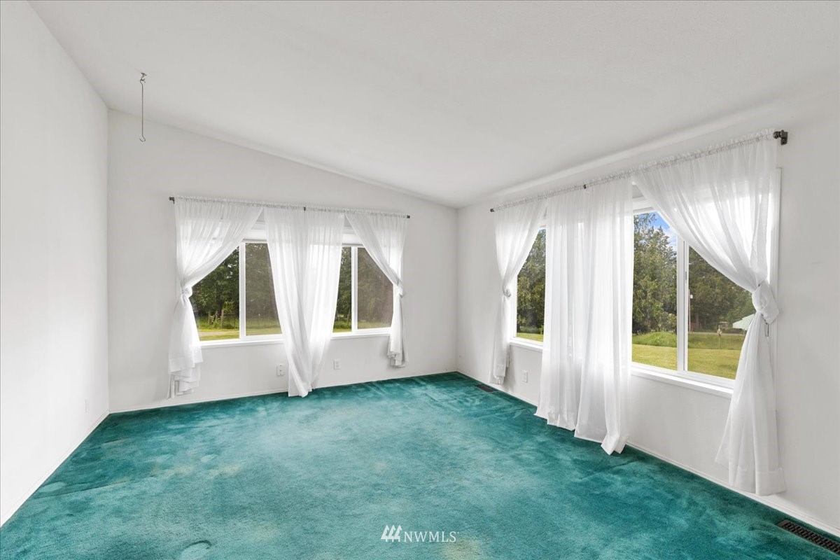 17455 Allen Road Bow, WA 98232 - Photo 14 of 33 an empty room with windows
