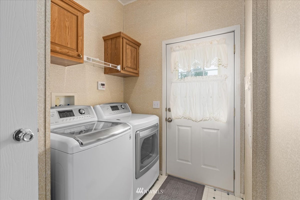 17455 Allen Road Bow, WA 98232 - Photo 22 of 33 a utility room with dryer and washer