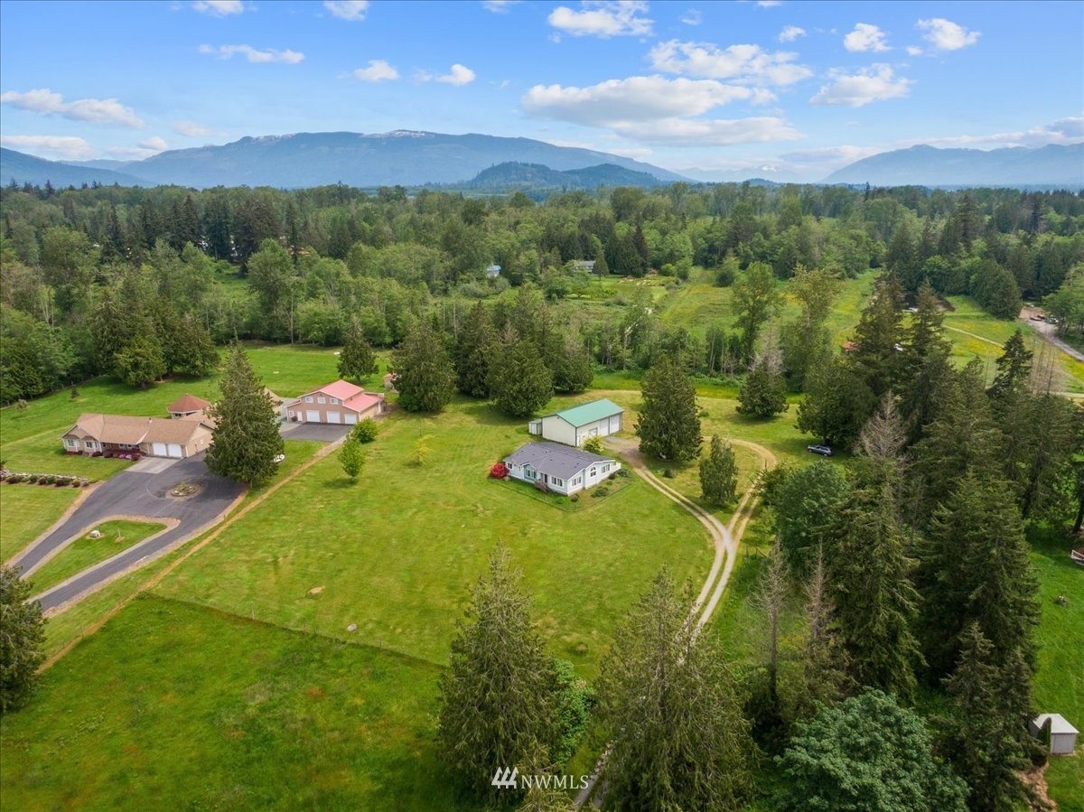17455 Allen Road Bow, WA 98232 - Photo 31 of 33 a view of a golf course with a lake