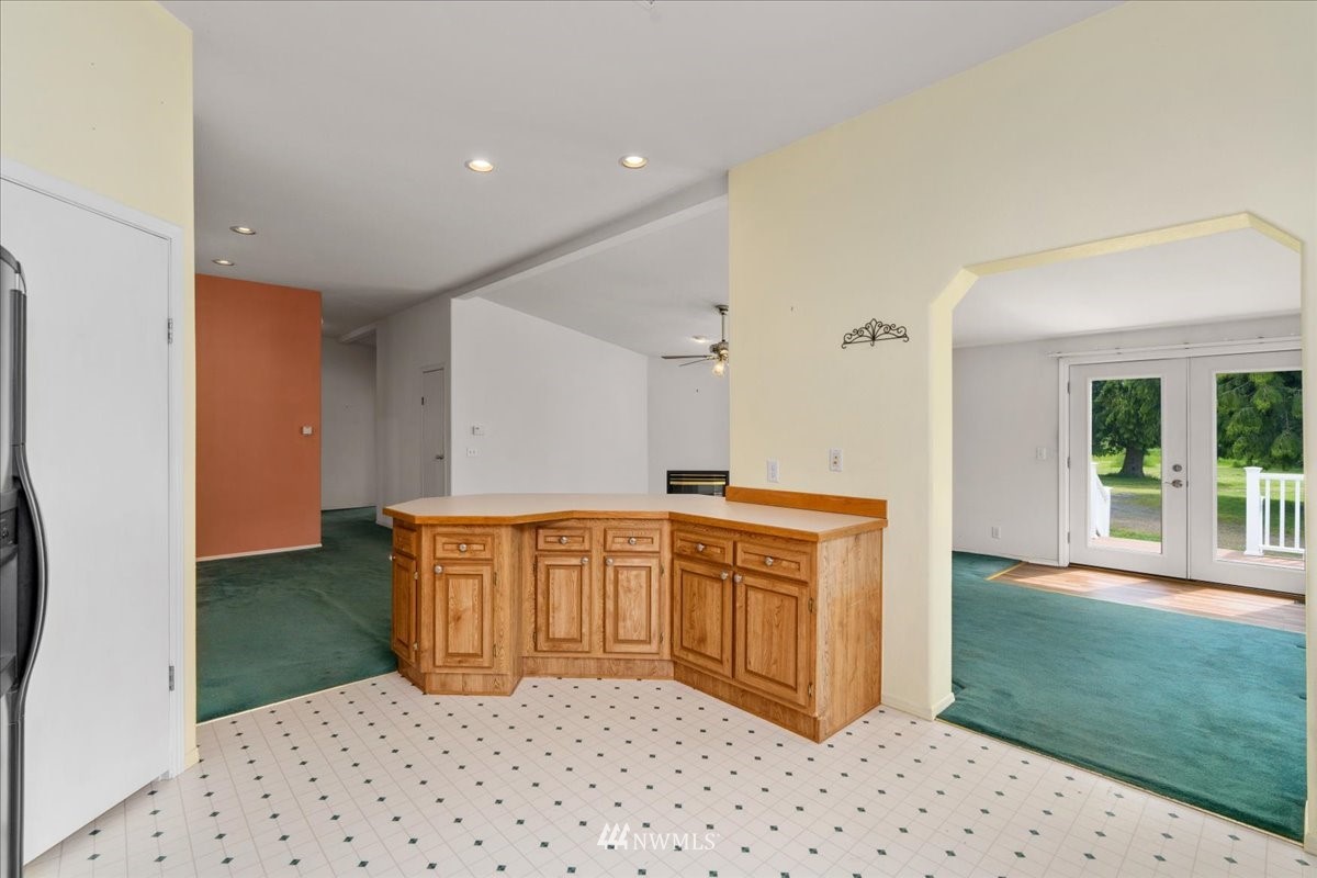 17455 Allen Road Bow, WA 98232 - Photo 9 of 33 a bathroom with a tub shower and sink