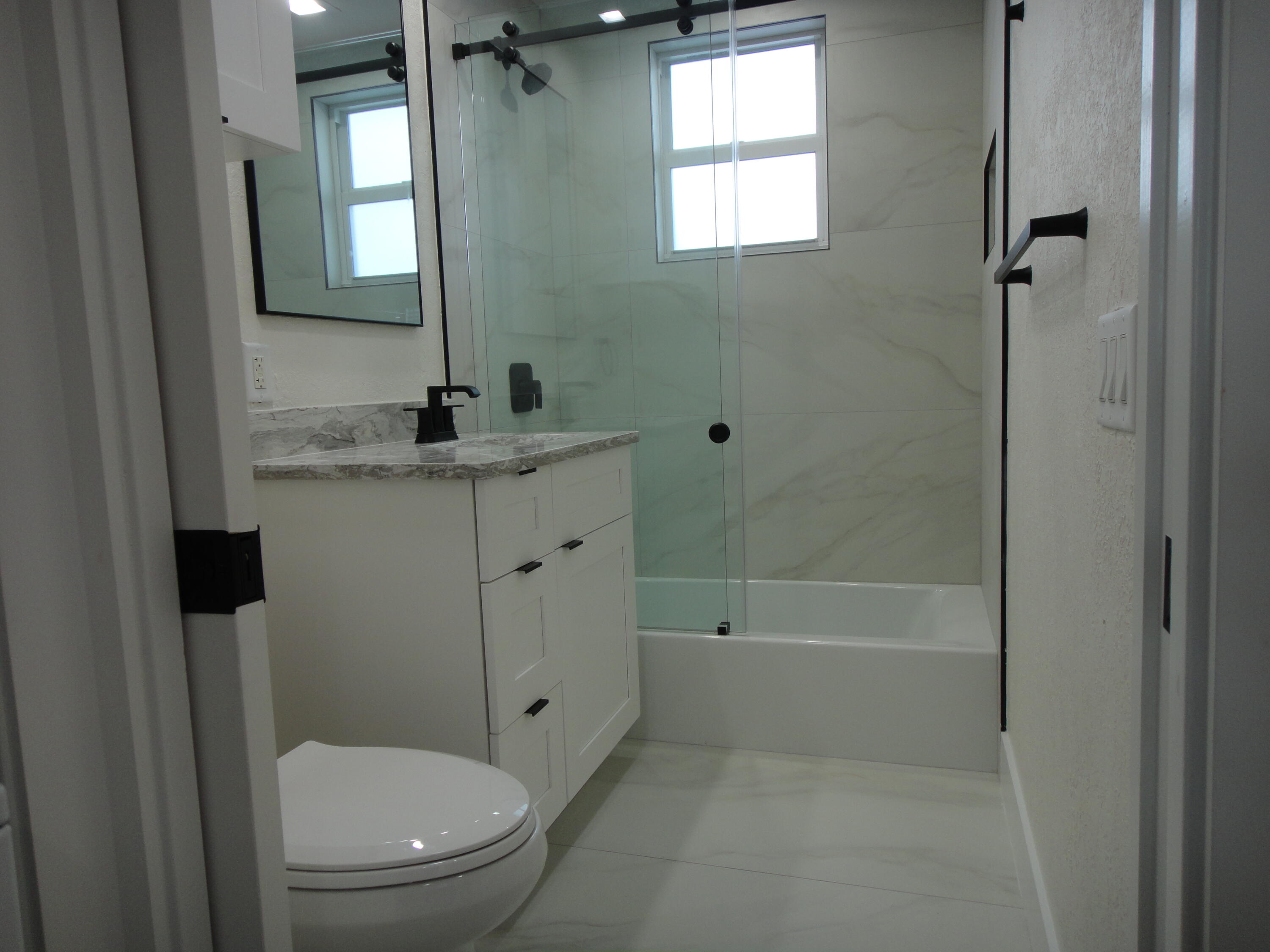 717 Bunker Road West Palm Beach, FL 33405 - Photo 6 of 9 BATHROOM