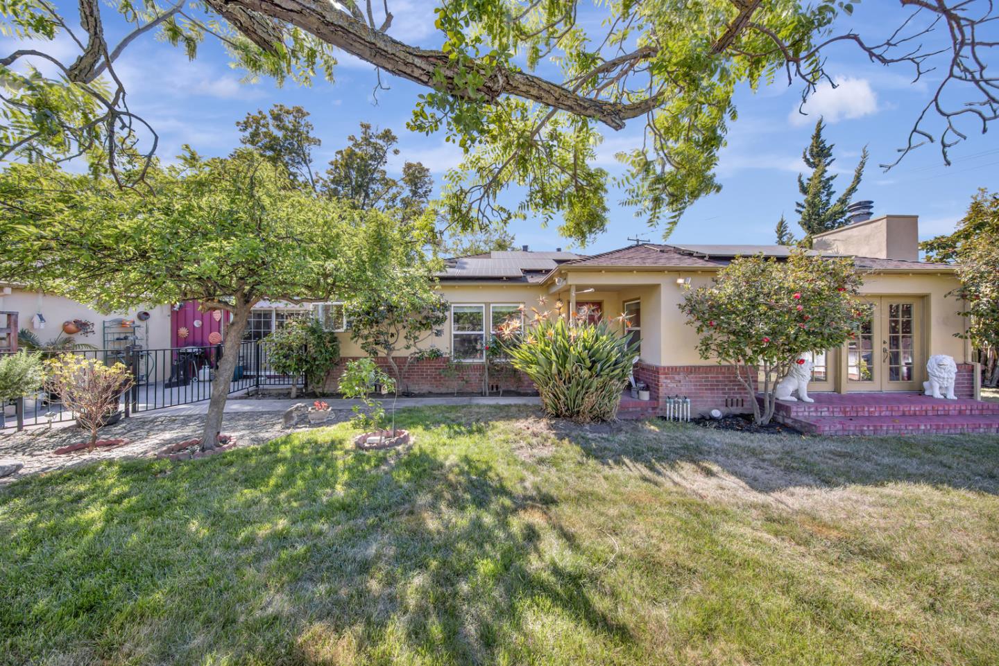 front view of a house with a yard