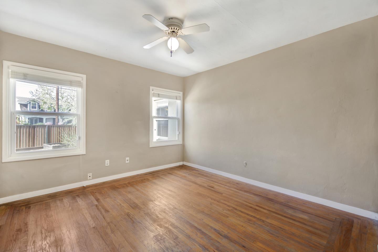 1265 Burrows Road Campbell, CA 95008 - Photo 21 of 32 wooden floor in an empty room with a window