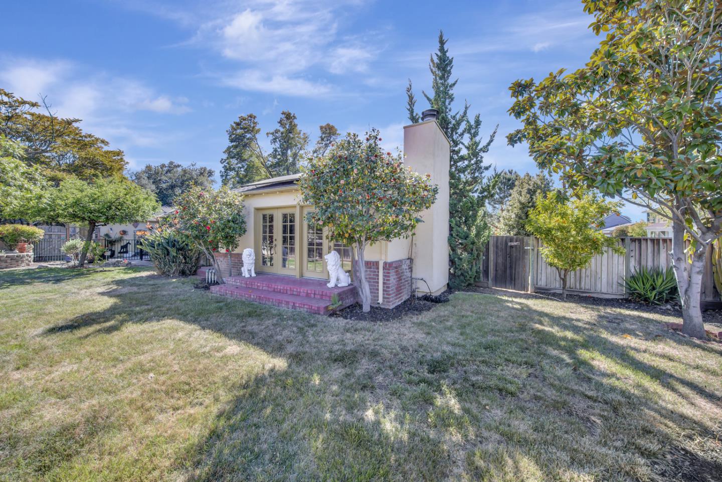 1265 Burrows Road Campbell, CA 95008 - Photo 4 of 32 a view of a house with yard and tree s