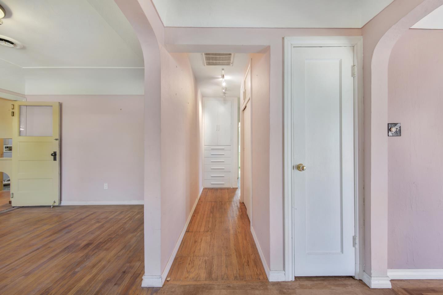 1265 Burrows Road Campbell, CA 95008 - Photo 5 of 32 a view of a hallway with wooden floor