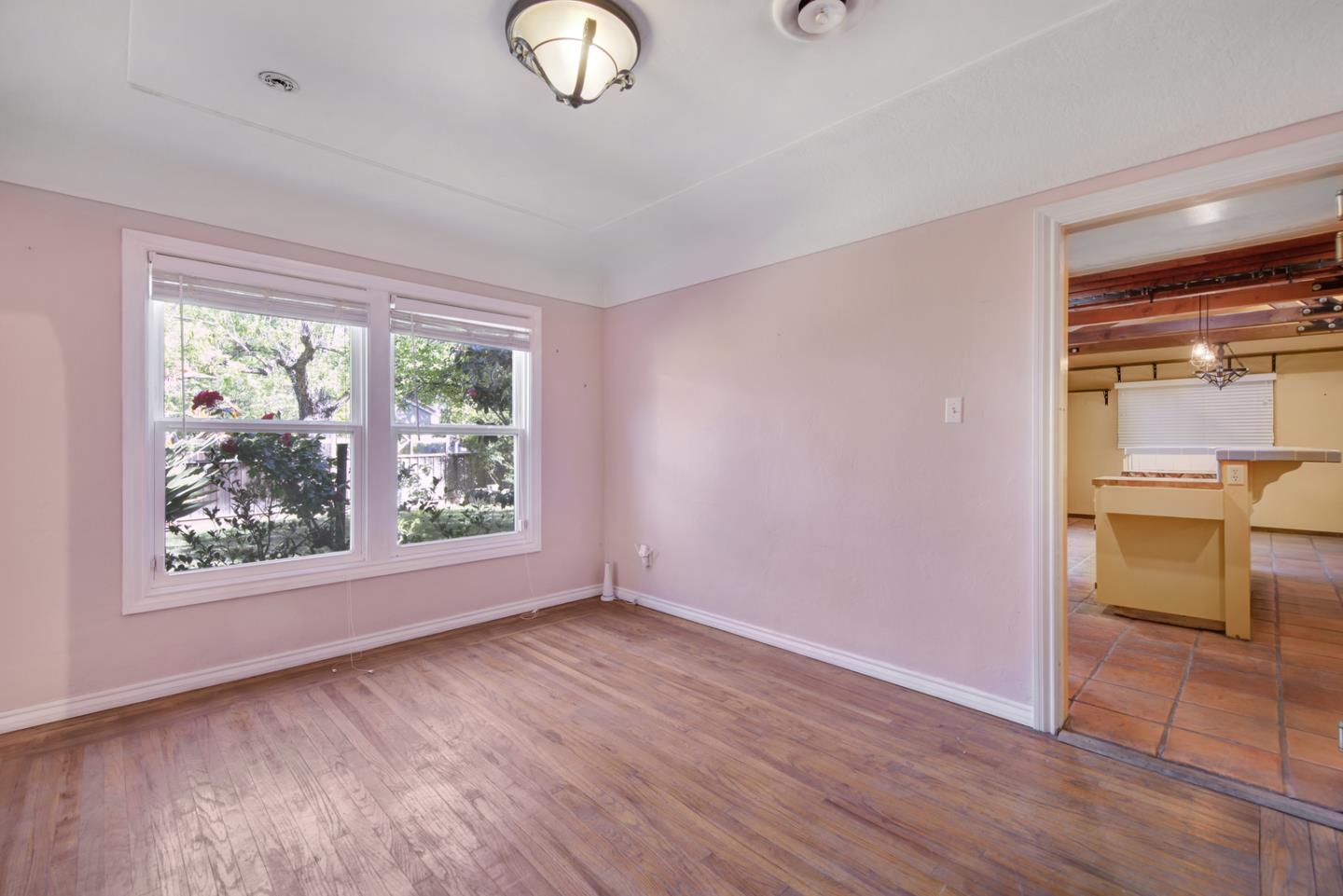 1265 Burrows Road Campbell, CA 95008 - Photo 8 of 32 wooden floor in an empty room with a window