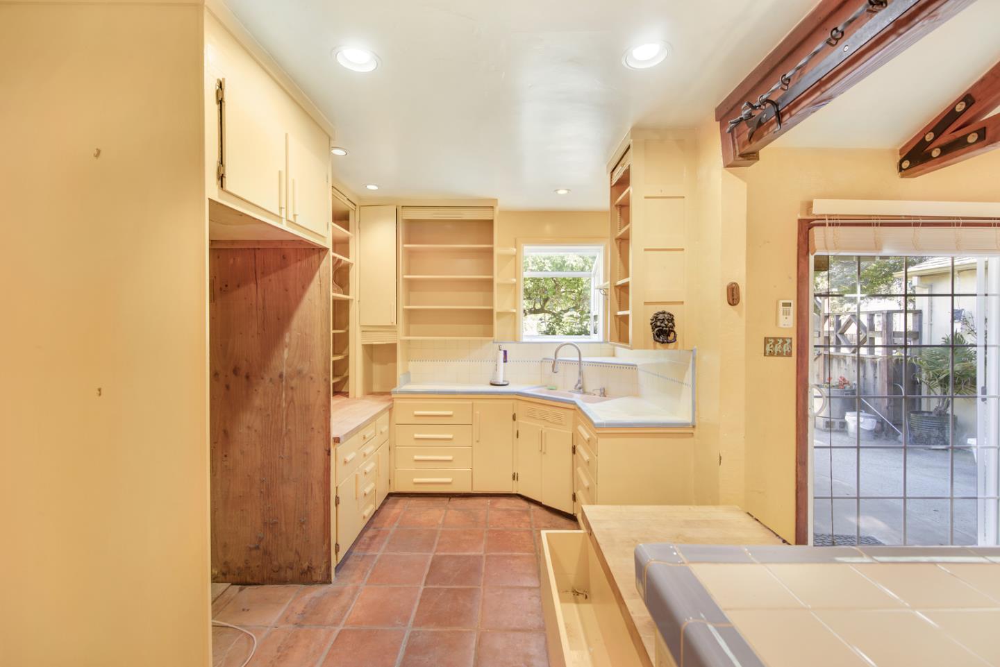 1265 Burrows Road Campbell, CA 95008 - Photo 10 of 32 a bathroom with a tub shower and sink