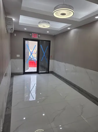 a view of room with projector and furniture