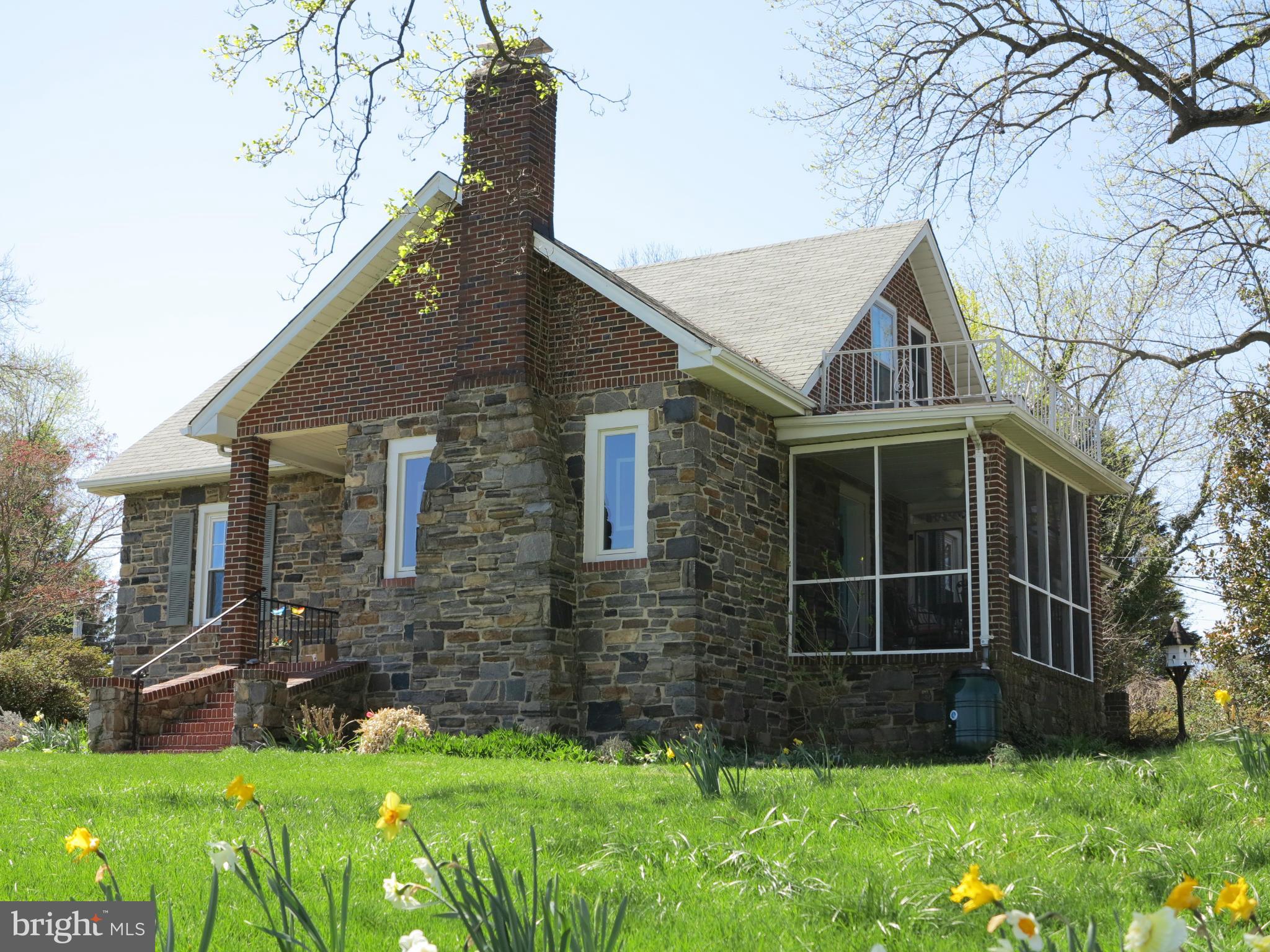238 Ridgeway Road Baltimore, MD 21228 - Photo 1 of 30 a front view of house with yard