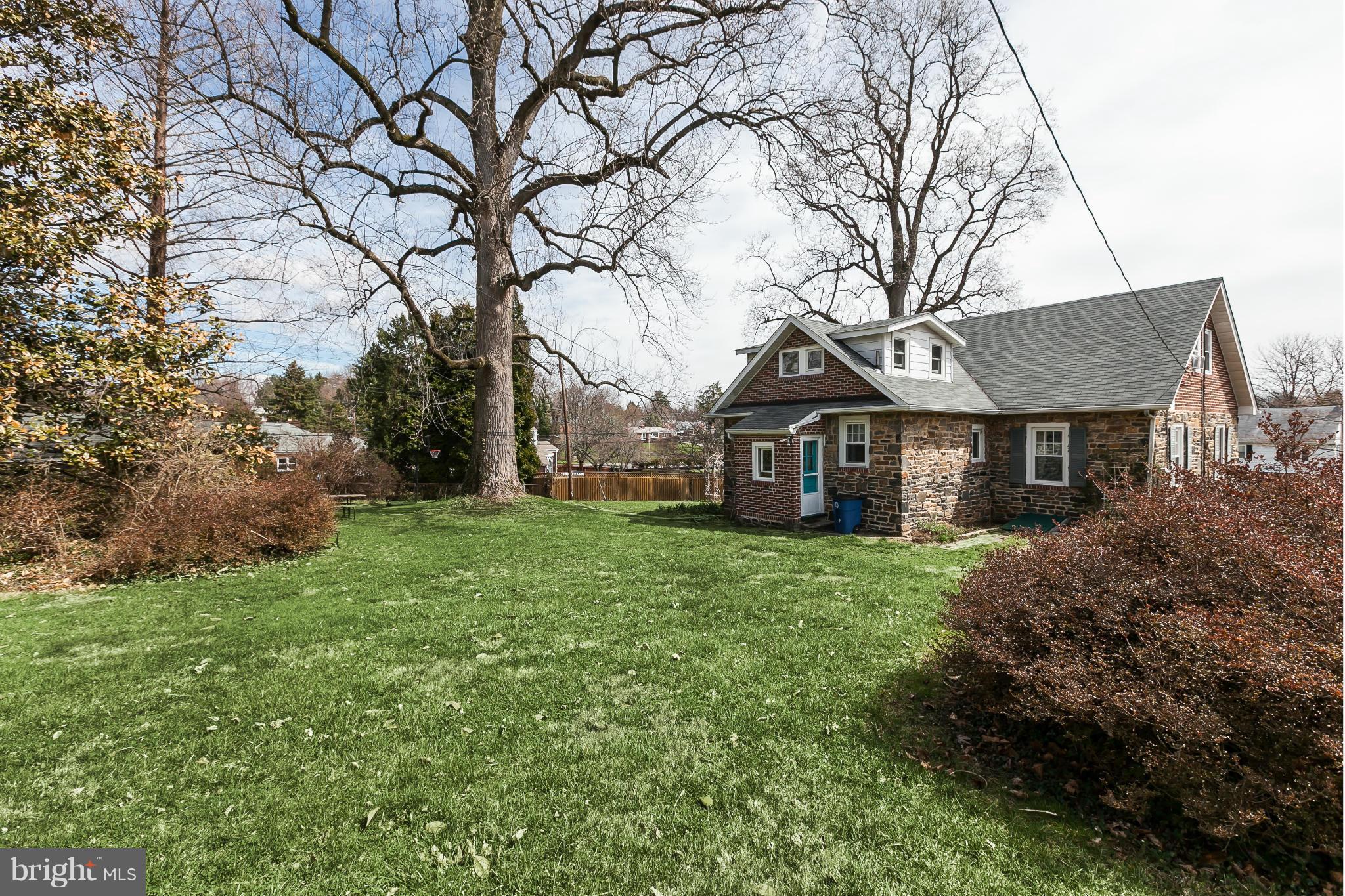 238 Ridgeway Road Baltimore, MD 21228 - Photo 2 of 30 a view of a yard in front of house