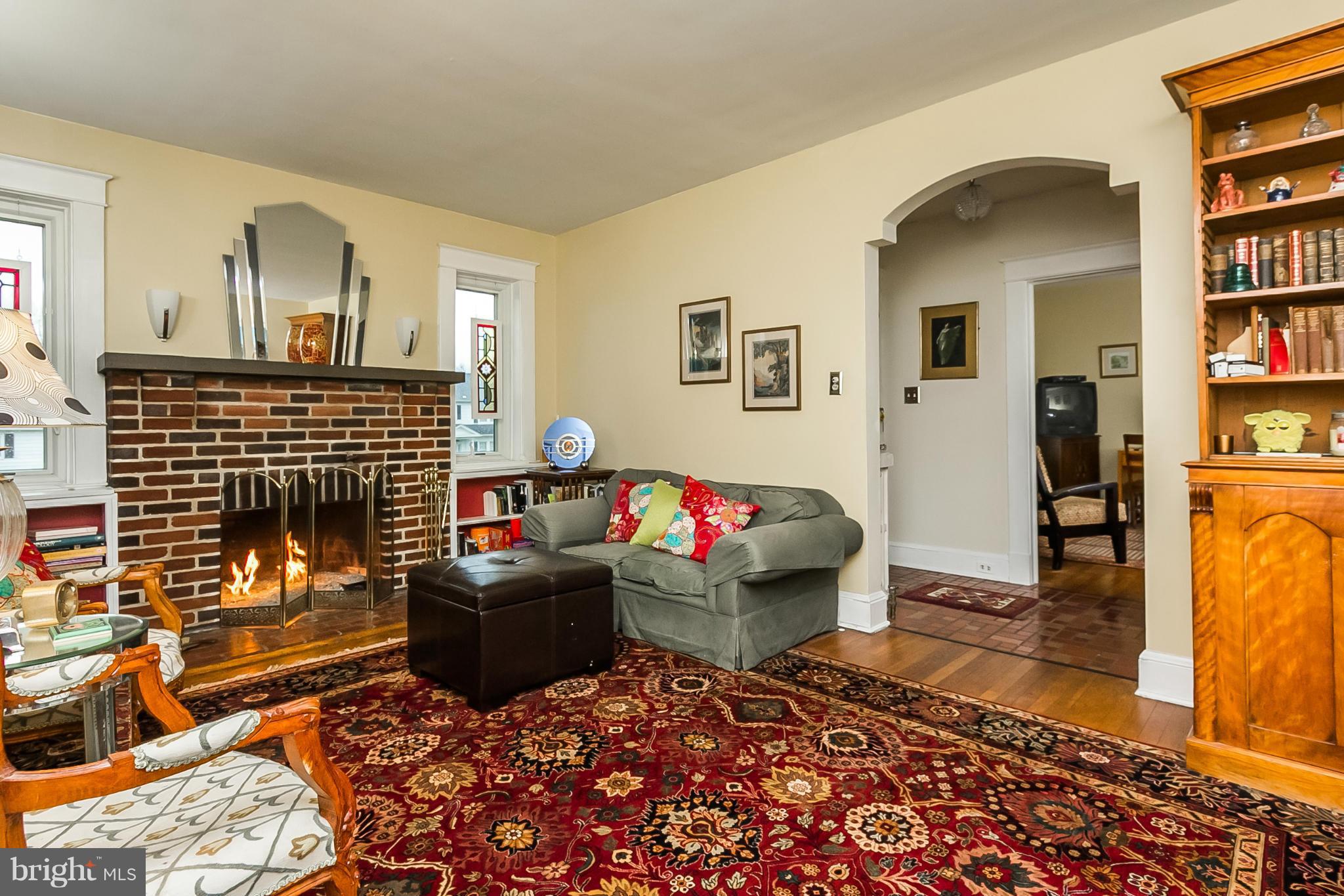 238 Ridgeway Road Baltimore, MD 21228 - Photo 11 of 30 a living room with furniture and a fireplace