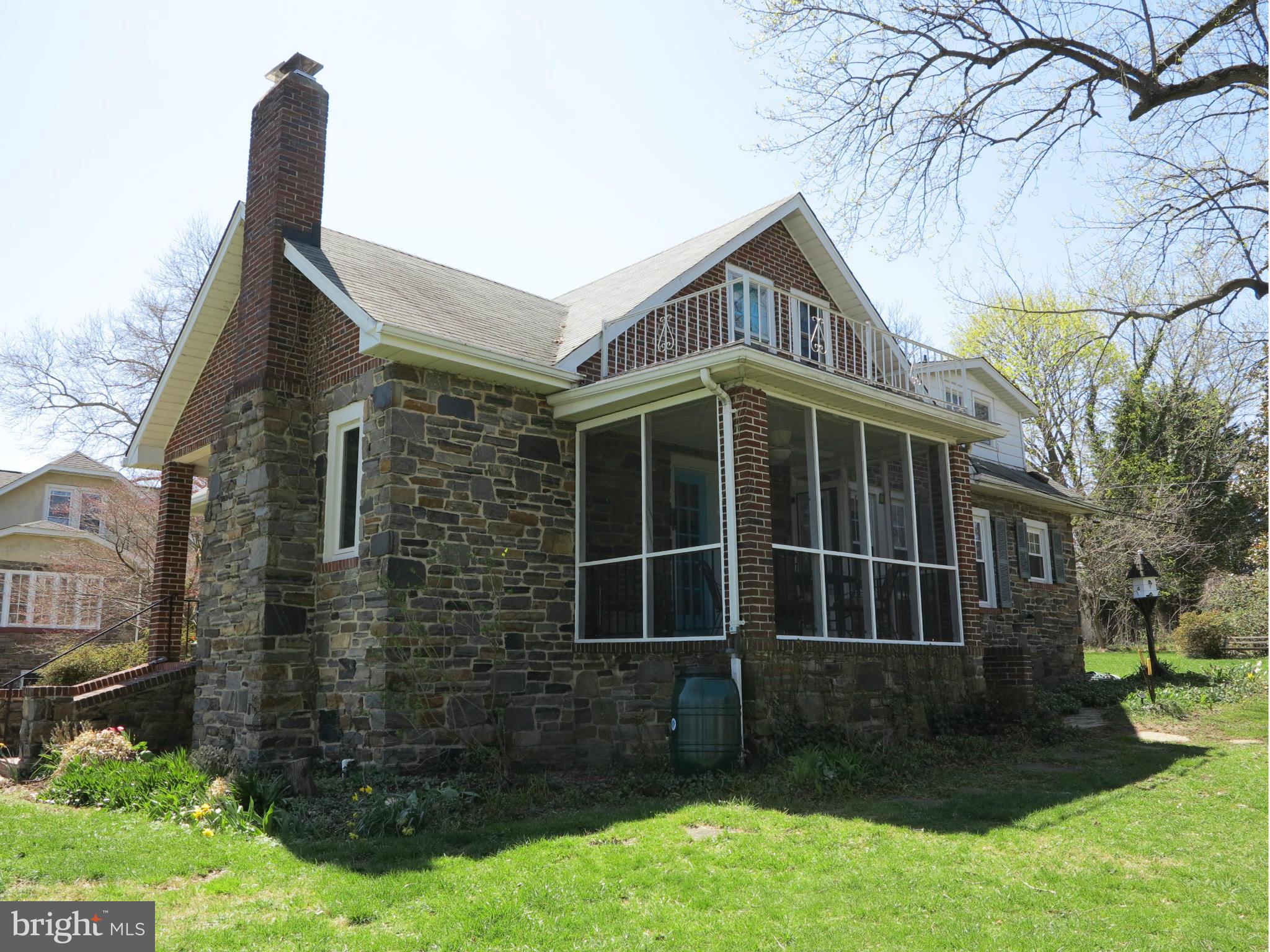 238 Ridgeway Road Baltimore, MD 21228 - Photo 13 of 30 a front view of a house with garden