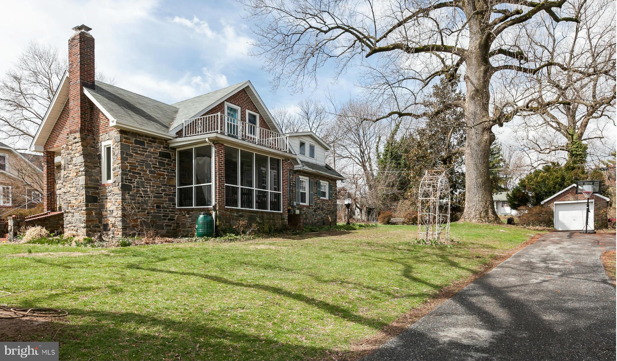 238 Ridgeway Road Baltimore, MD 21228 - Photo 14 of 30 a front view of a house with a yard