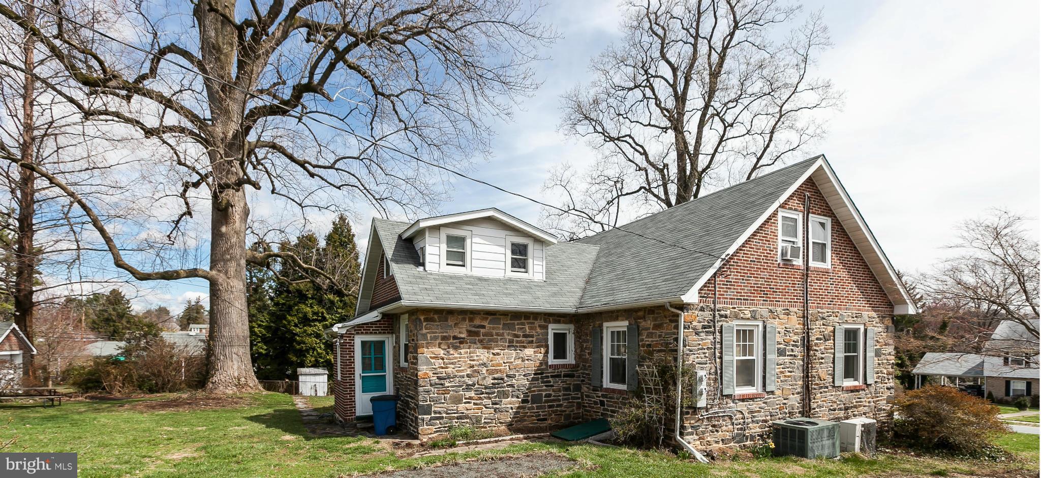 238 Ridgeway Road Baltimore, MD 21228 - Photo 15 of 30 a view of a house with a yard