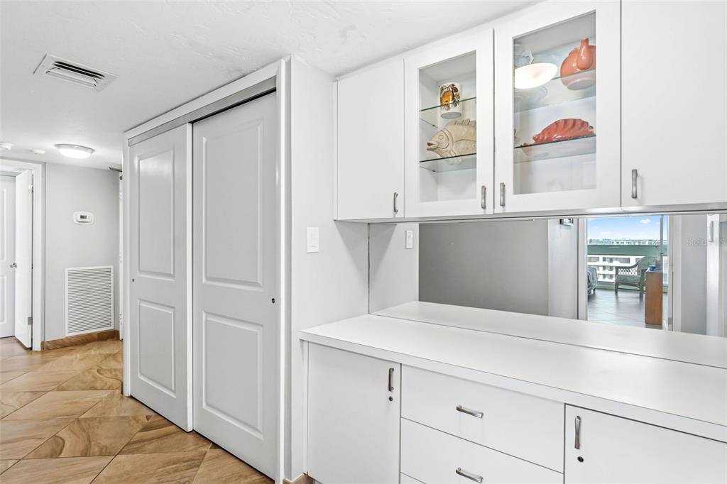 5966 Midnight Pass Road, Unit G113 Sarasota, FL 34242 - Photo 6 of 39 a bedroom with a bed and a window