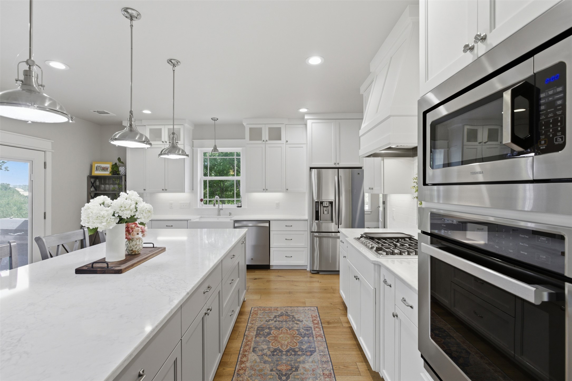 1804 Tanner Loop Taylor, TX 76574 - Photo 9 of 40 The show-stopping kitchen is equipped with built-in appliances.