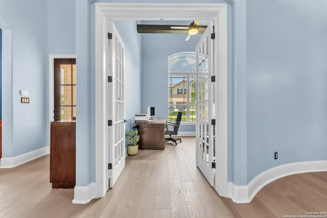 a bathroom with a sink a mirror and a bathtub